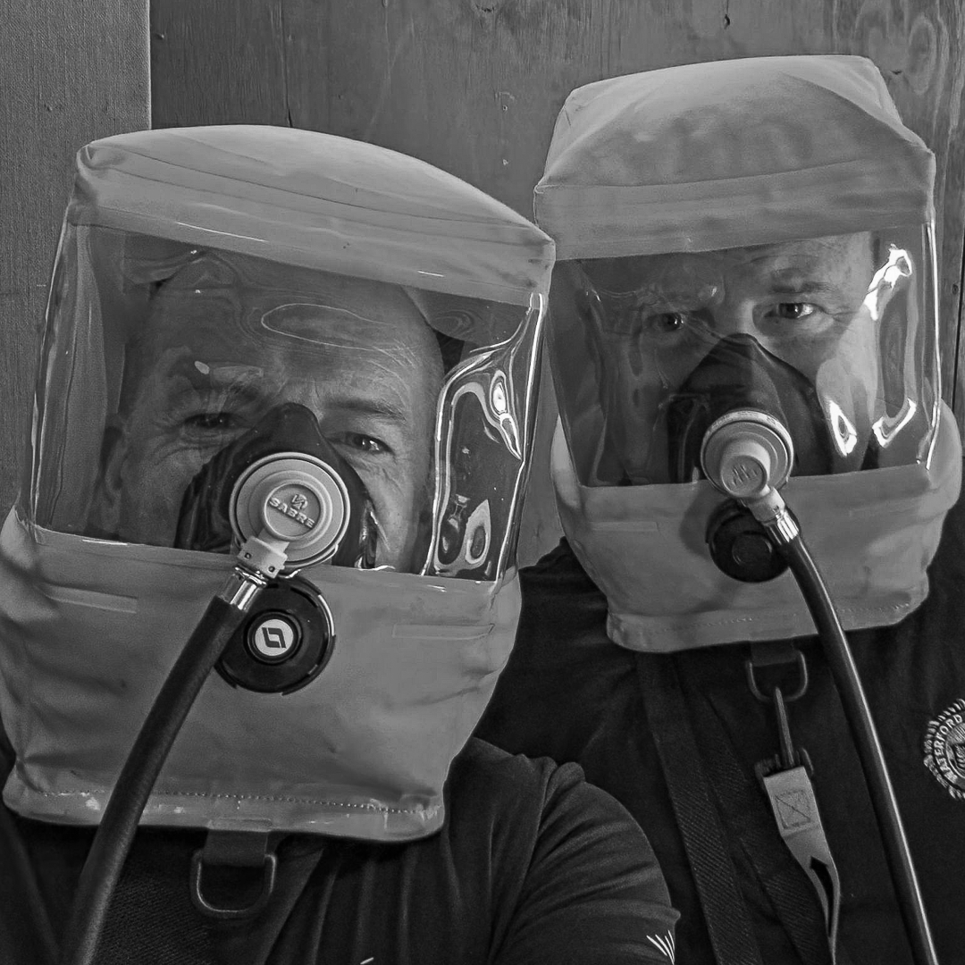 Fire service officers during confined space training at Outreach Rescue